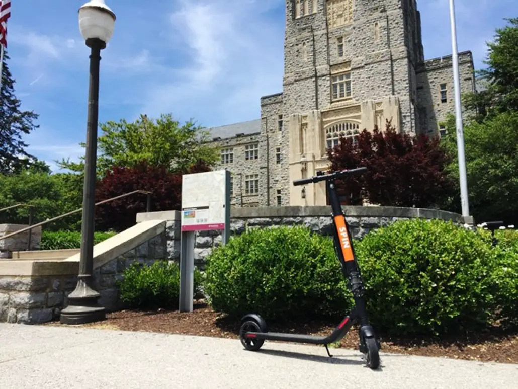 a scooter next to a building